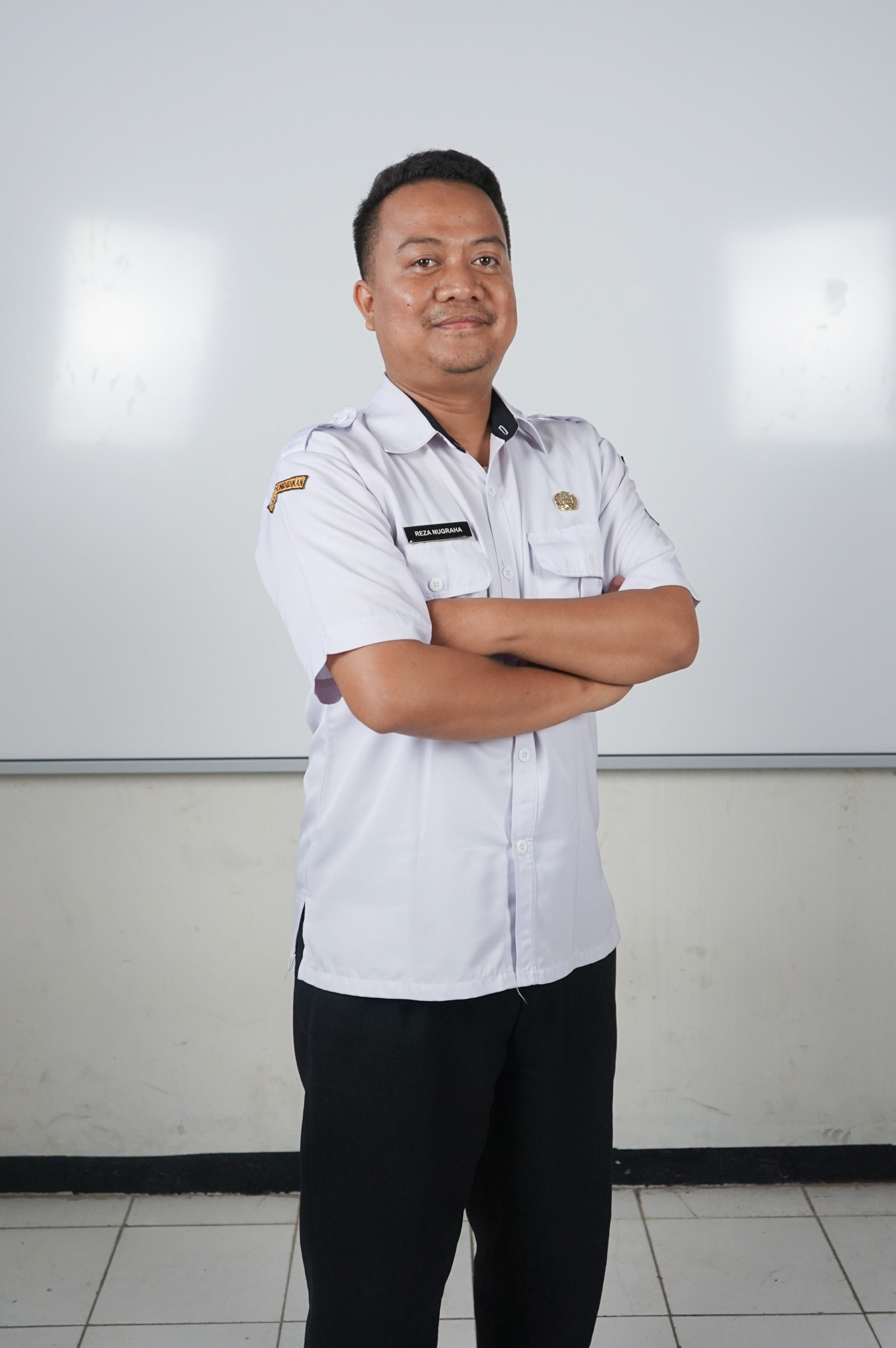 Pak Reza - Staff Name - SMAN 21 Bandung class 2025